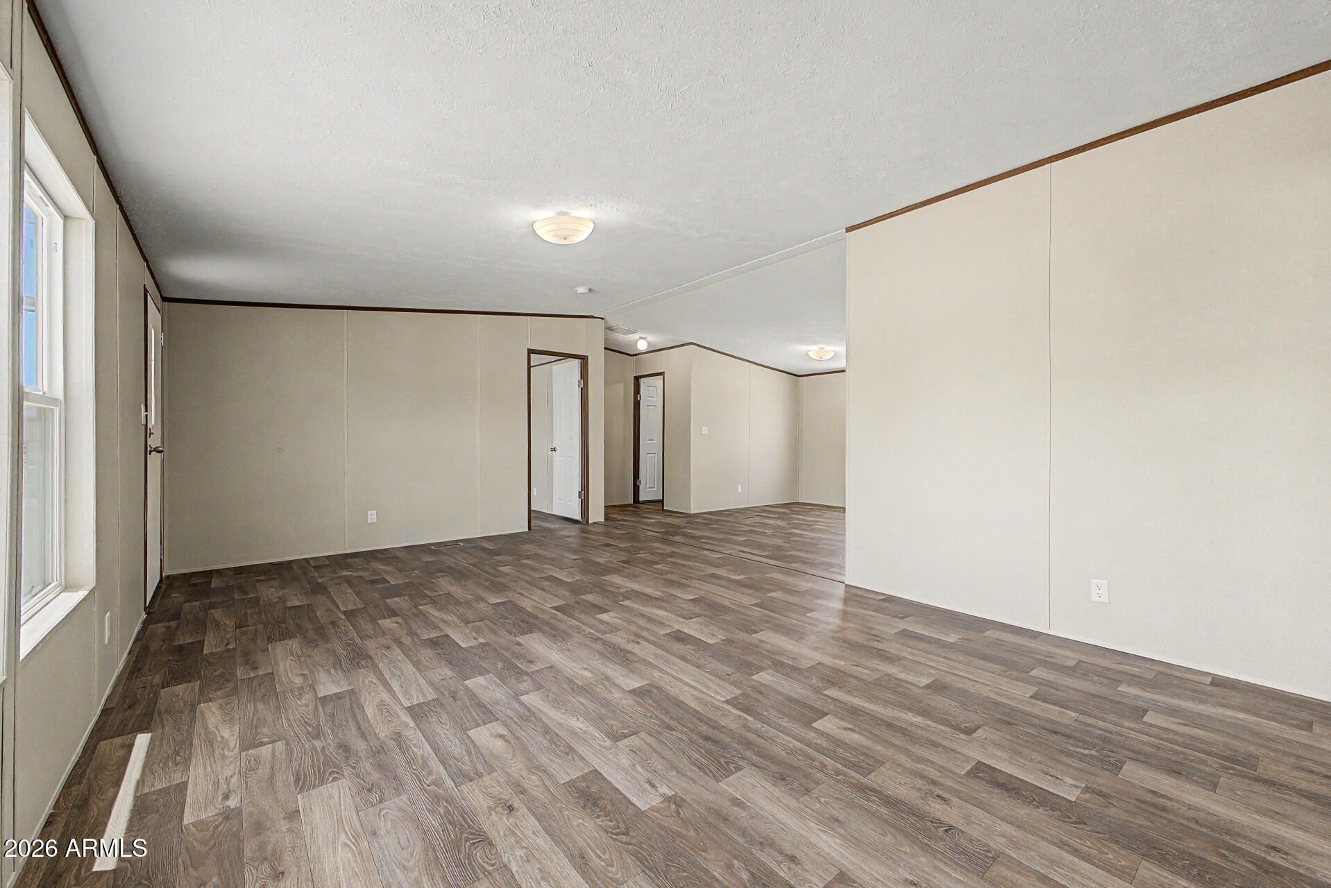 DESERT VILLAGE 2 LT 1-22,54-56,141-152&TR B&C subdivision, and MCR 7725. - Residential