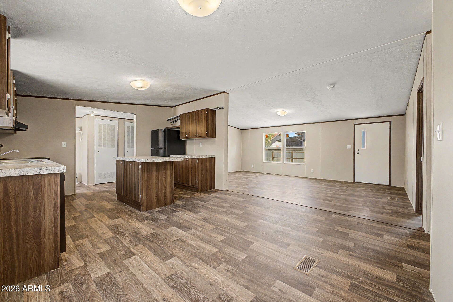 DESERT VILLAGE 2 LT 1-22,54-56,141-152&TR B&C subdivision, and MCR 7725. - Residential
