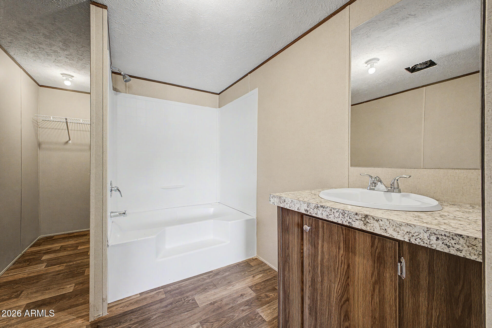 DESERT VILLAGE 2 LT 1-22,54-56,141-152&TR B&C subdivision, and MCR 7725. - Residential
