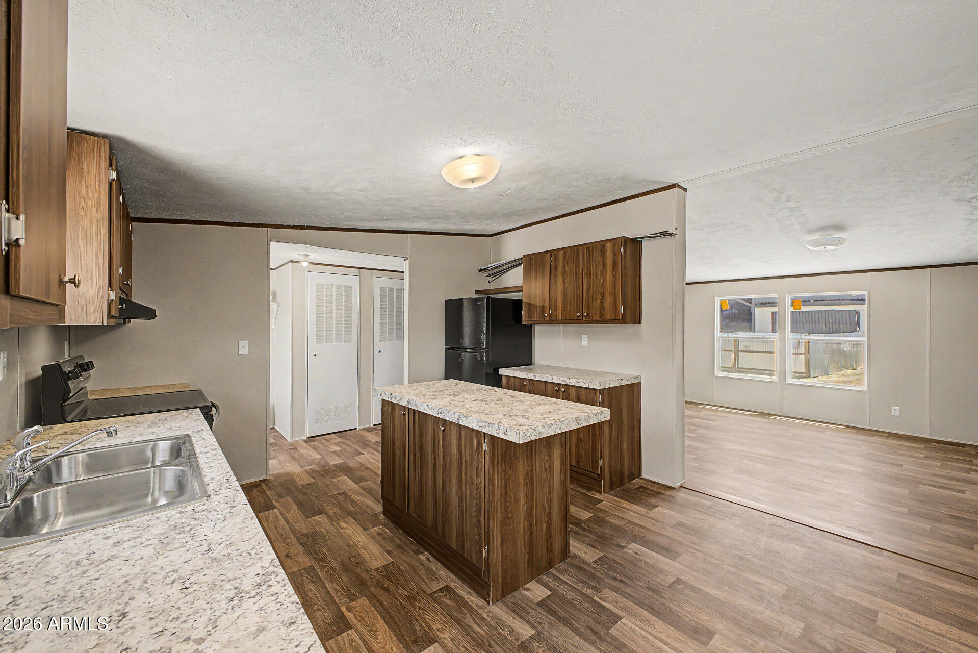 DESERT VILLAGE 2 LT 1-22,54-56,141-152&TR B&C subdivision, and MCR 7725. - Residential