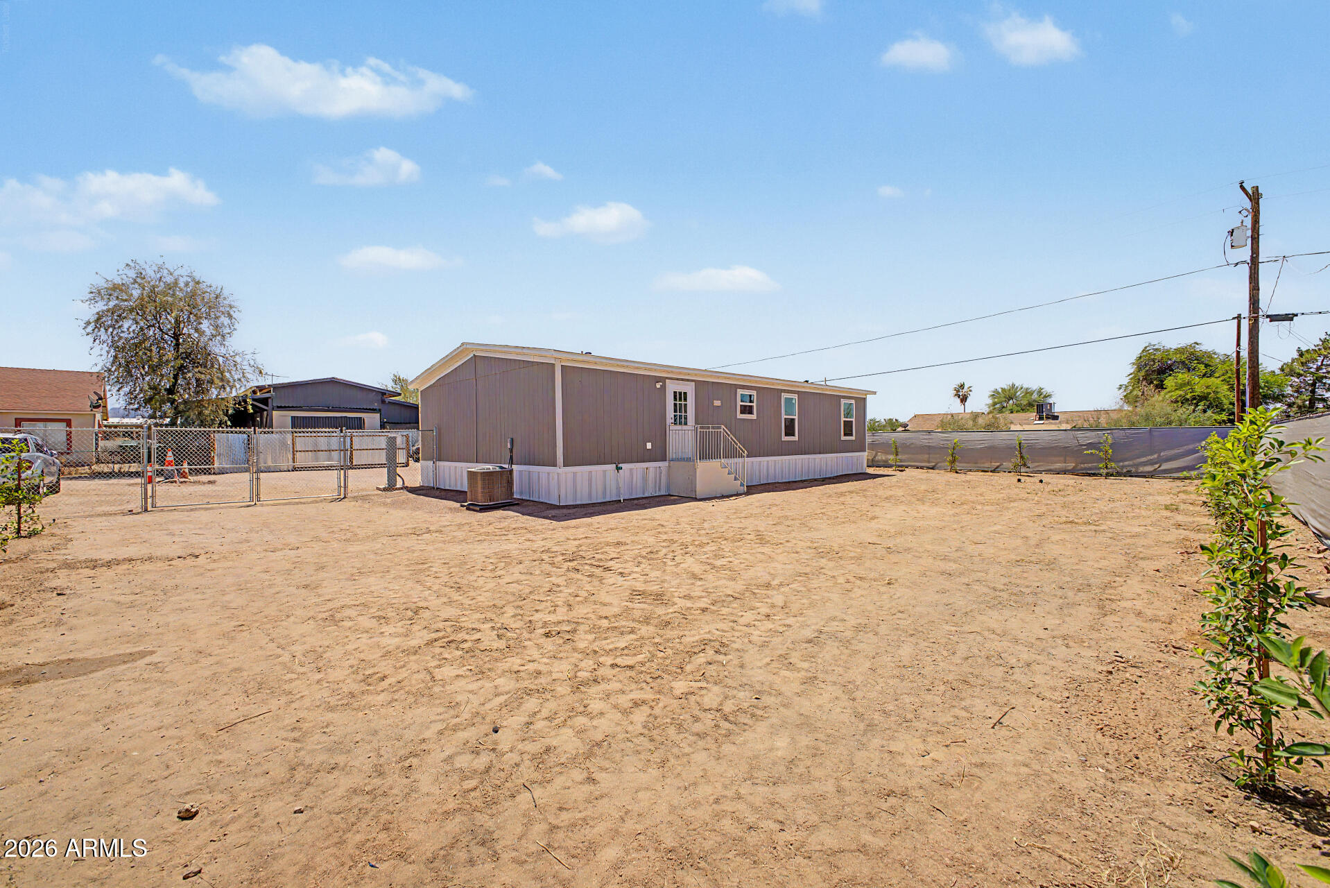 DESERT VILLAGE 2 LT 1-22,54-56,141-152&TR B&C subdivision, and MCR 7725. - Residential