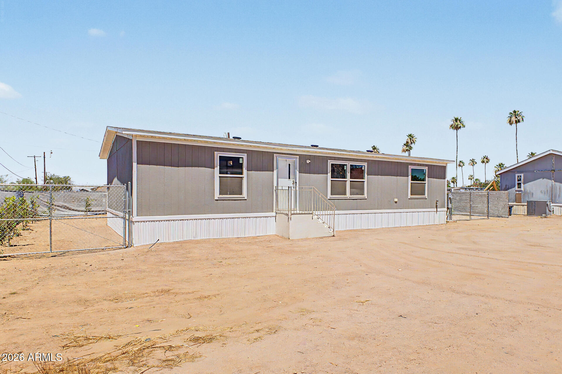 DESERT VILLAGE 2 LT 1-22,54-56,141-152&TR B&C subdivision, and MCR 7725. - Residential