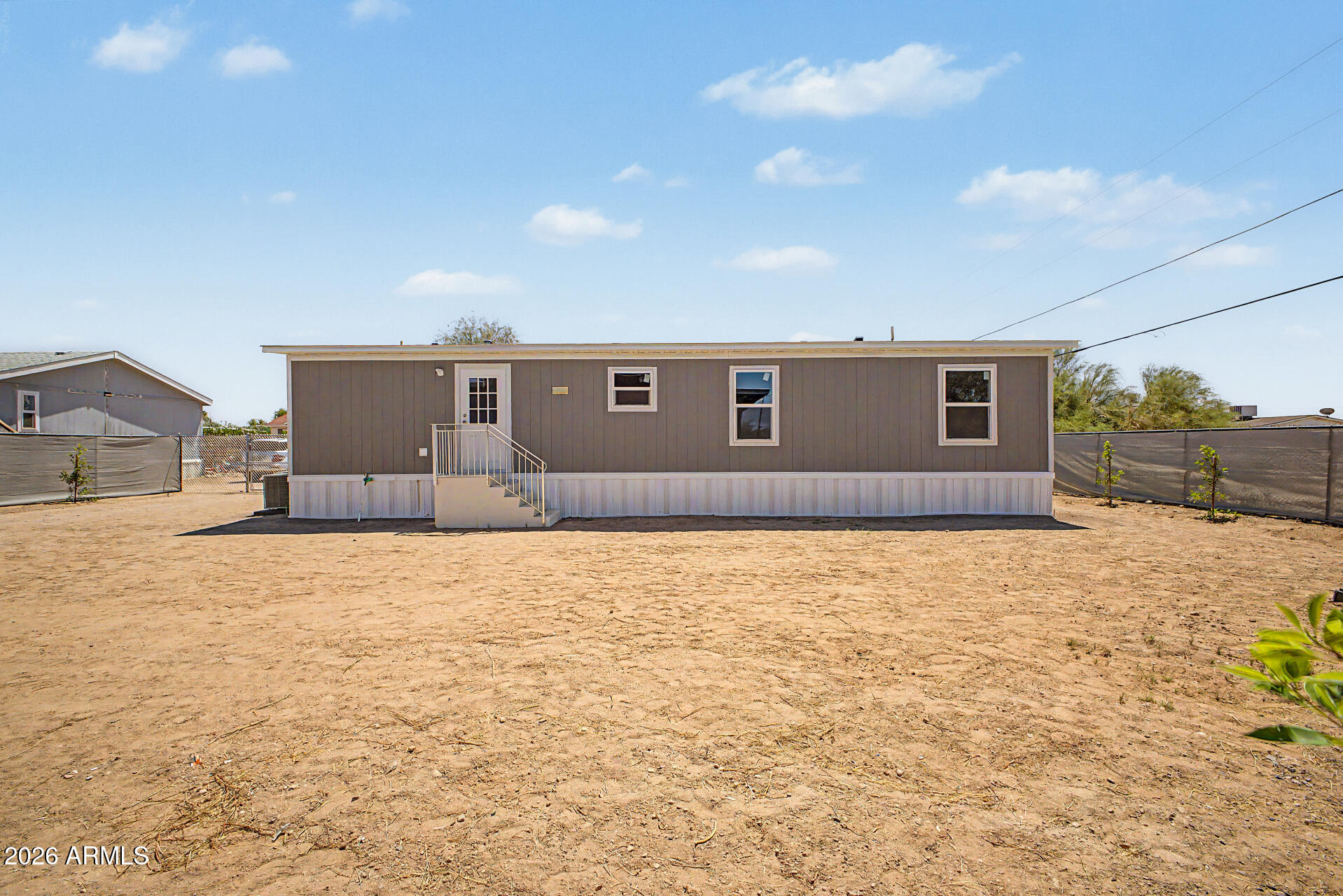 DESERT VILLAGE 2 LT 1-22,54-56,141-152&TR B&C subdivision, and MCR 7725. - Residential