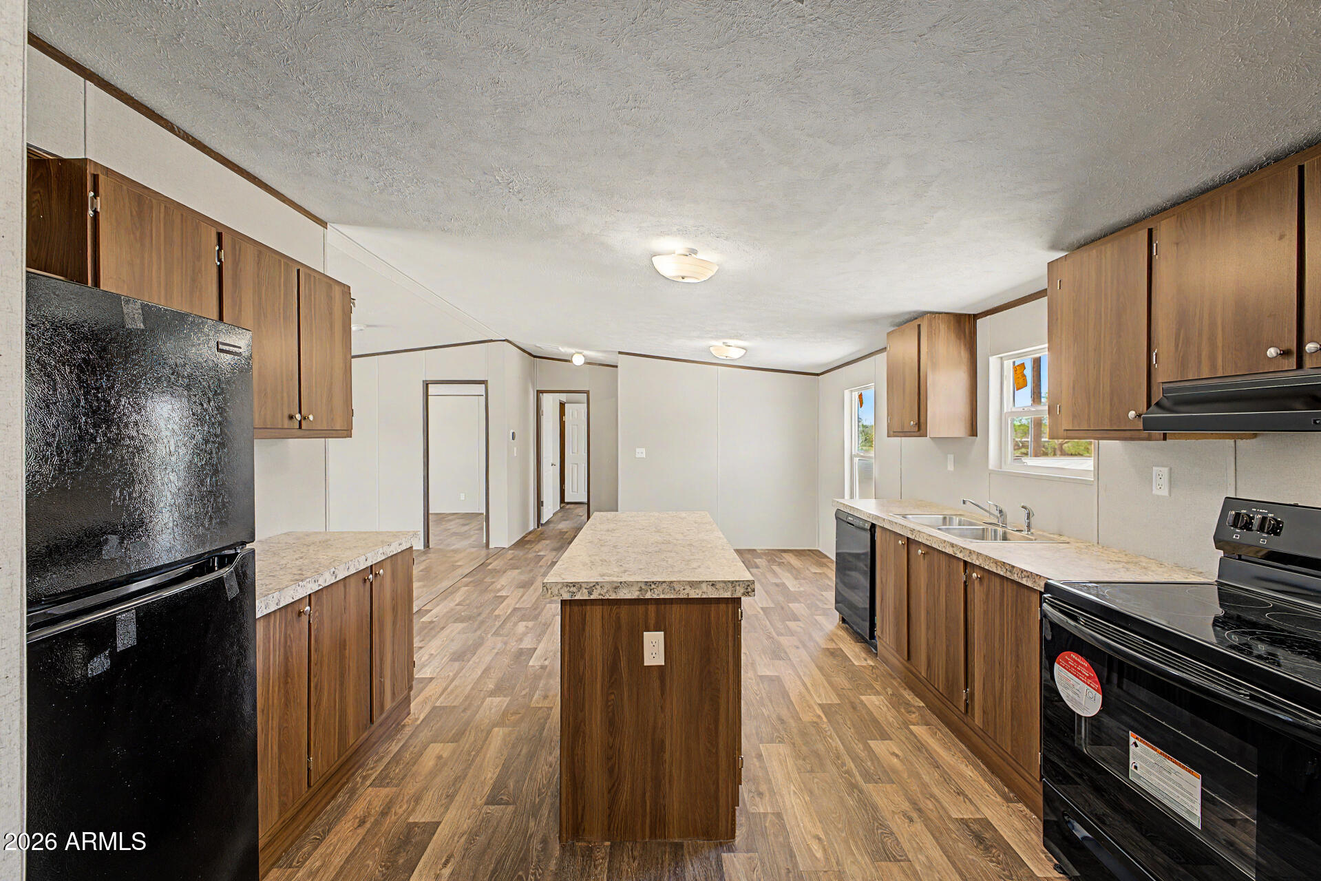 DESERT VILLAGE 2 LT 1-22,54-56,141-152&TR B&C subdivision, and MCR 7725. - Residential