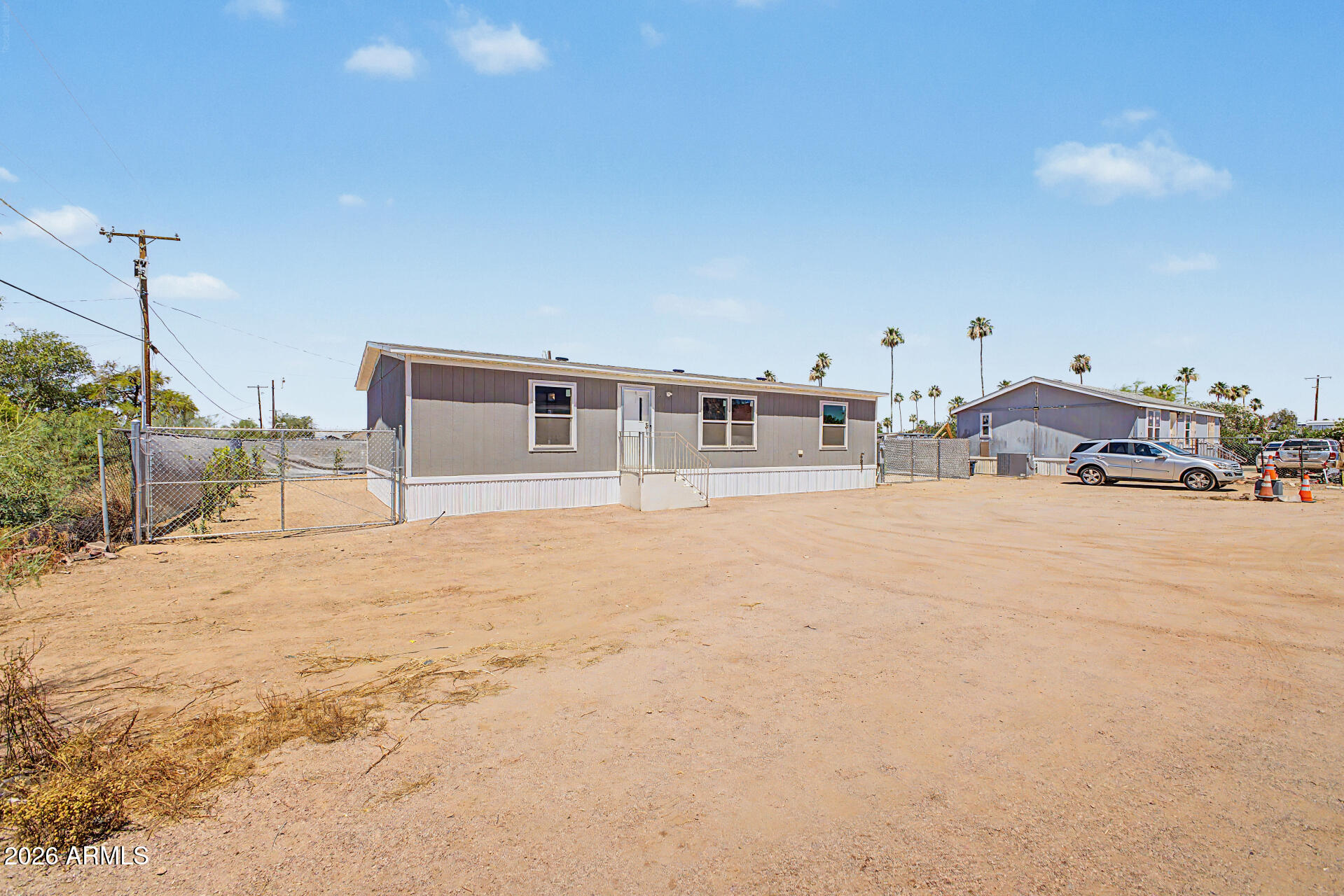 DESERT VILLAGE 2 LT 1-22,54-56,141-152&TR B&C subdivision, and MCR 7725. - Residential
