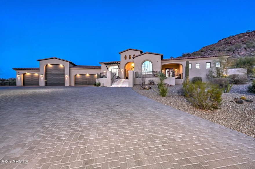 Luxurious North Peoria Home with 6 bd 5 bath 5 Car Garage 4906 total sqft w/ Guest Casita & Infinity Edge Pool/Spa * Located in Exclusive Gated Community of Alvamar * Situated on a Hillside, Cul de Sac lot w/ Expansive Views & Sunsets * Garages have 2100+ sqft of space w/ RV Bay & 14ft door * Guest Casita is 320 sqft w/ Full bath * Main House is 5 bd 5 bath 4586 sqft * Sleek Modern Design, Perfectly Laid out for Functionality & Entertaining * Control4 Home Automation, Sound & Security System * White Oak Wood Floors * Great Room features Gas Fireplace & 16 ft Glass Sliding Door w/ 12 ft Opening for seamless transition from Indoors to Outdoor Patio * Chef's Kitchen w/ 48'' Wolf Gas Stove w/ Pot Filler, Built-In Subzero Fridge, Wolf Microwave, Designer White Kitchen Cabinets w/ Marble Countertops & Large Island w/ Butcher Block Prep Area * Butler's Pantry & Walk-In Pantry w/ extra Fridge * Bonus/Theatre Room w/ Built-In Sound System & Designer Wet Bar w/ Ice Maker & Fridge * Custom Glass Front Door Captures Stunning Sunsets & City Lights * Formal Dining Room has Built-In Wine Cellar & Large Windows to Capture Views * Master Suite has Front & Back Patios, Laundry Hookup, Walk-In Closet * Master Bath features Soaking Tub w/ Desert Views, Large Glass Shower & Dual Vanities * Large Covered Back Patio w/ Gas Fireplace & TV * Elevated Infinity Edge Pool/Spa spills into 42 ft Reflection Pool w/ 3 Water Features, Safety Gates & Removable Pool Fence * Enjoy the Sunsets & City Views on the Expanded Front Patio w/ Water Feature * Laundry Room Features Pet Wash Station and access to Enclosed Dog Run * Owned 18Kw Solar System * Custom Curtains & Mechanical Shade * Grass Backyard * Easy access to Loop 303, Paloma Park and miles of Hiking/Biking Trails