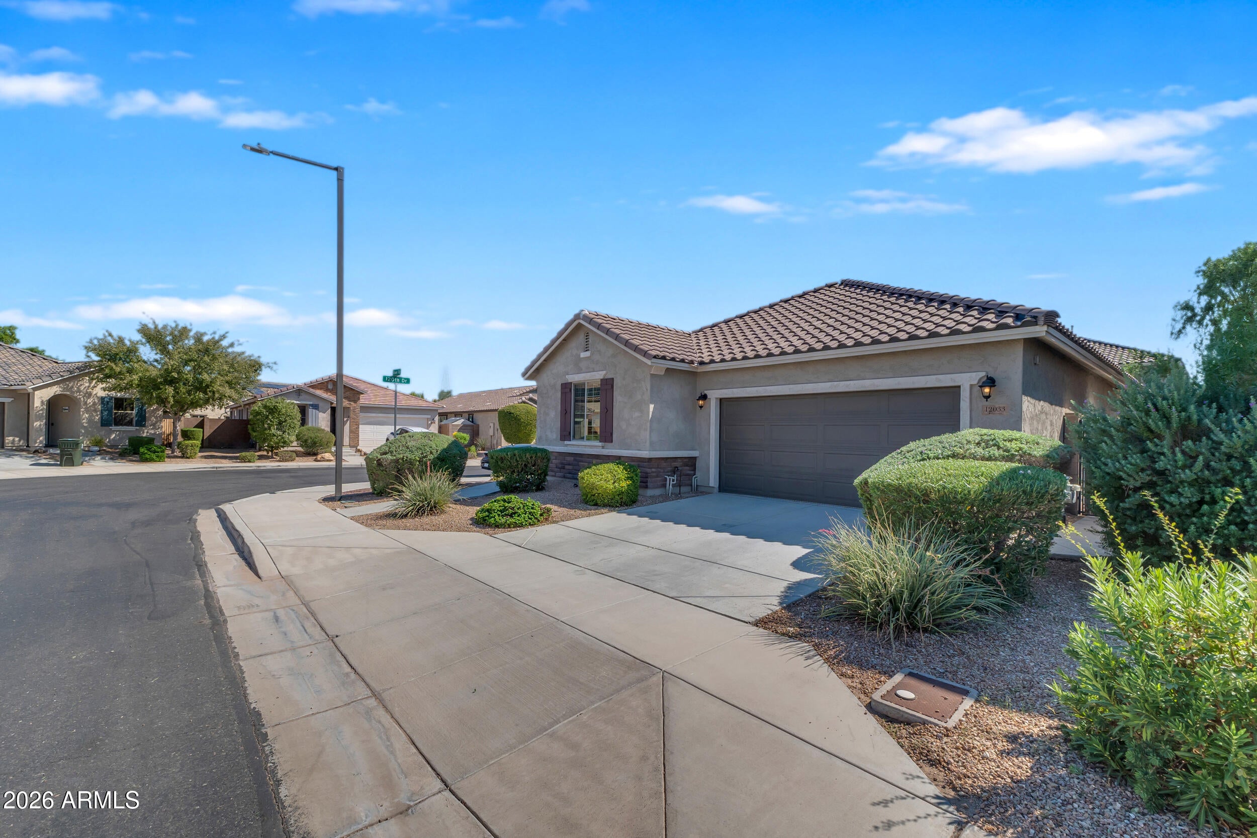 12033 W ROWEL Road