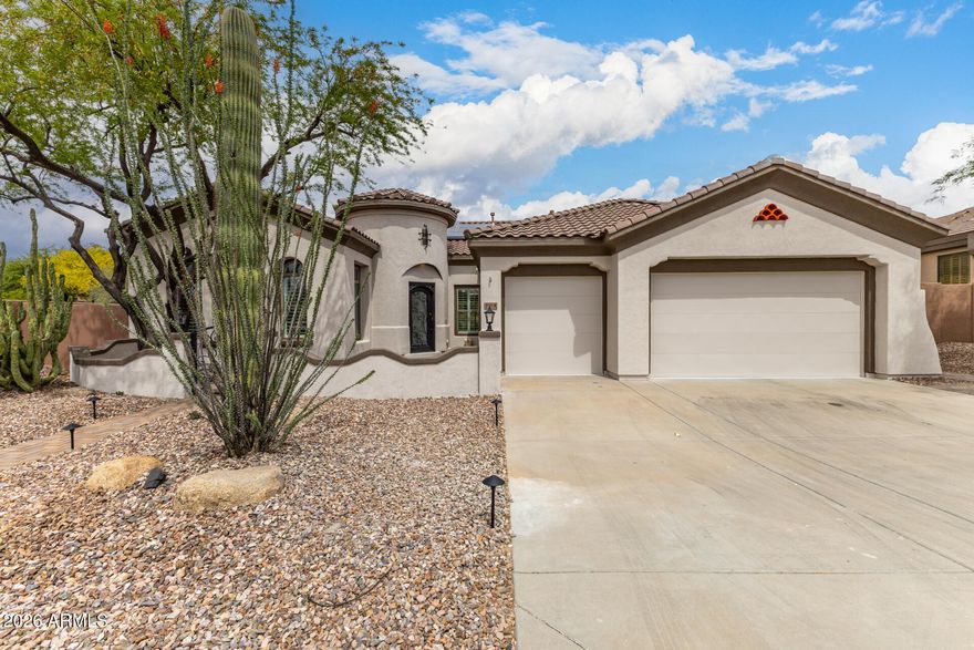 Completely renovated with exceptional, high-end upgrades, this stunning home offers a sleek contemporary design with an open, split floor-plan ideal for modern living. Porcelain tile flooring flows throughout, complemented by a striking stone porcelain accent wall and two elegant electric fireplaces. The chef's kitchen features granite countertops, while the spa-inspired bathrooms showcase marble vanities with a clean, modern aesthetic. A well-appointed laundry room includes a sink and stacked washer and dryer. The garage is upgraded with an epoxy floor and powerful LED lighting. Step outside to a refreshing natural view and natural stone tile backyard   refreshing pool—perfect for enjoying hot summer days in style.
