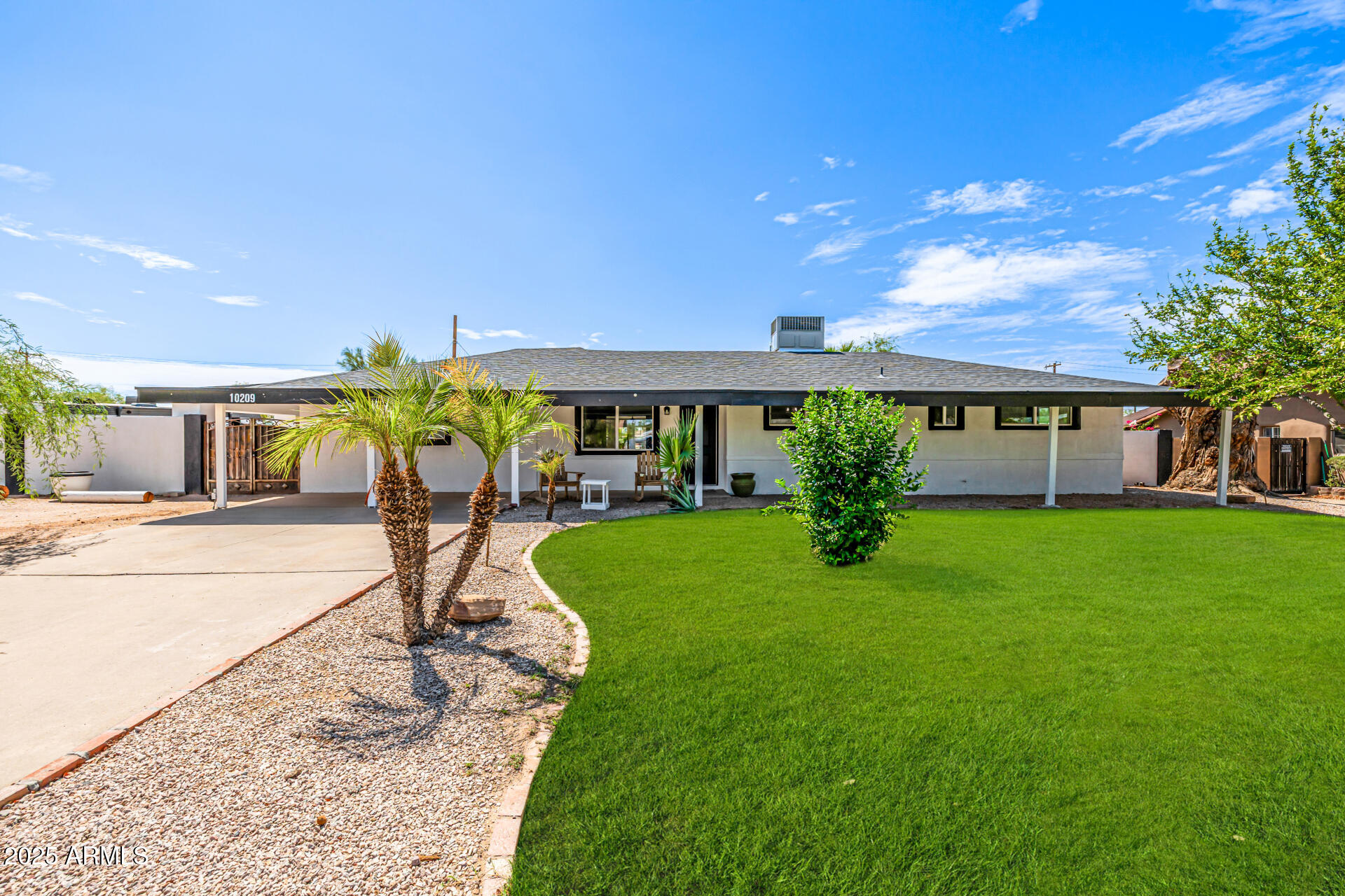 10209 E JONES Avenue