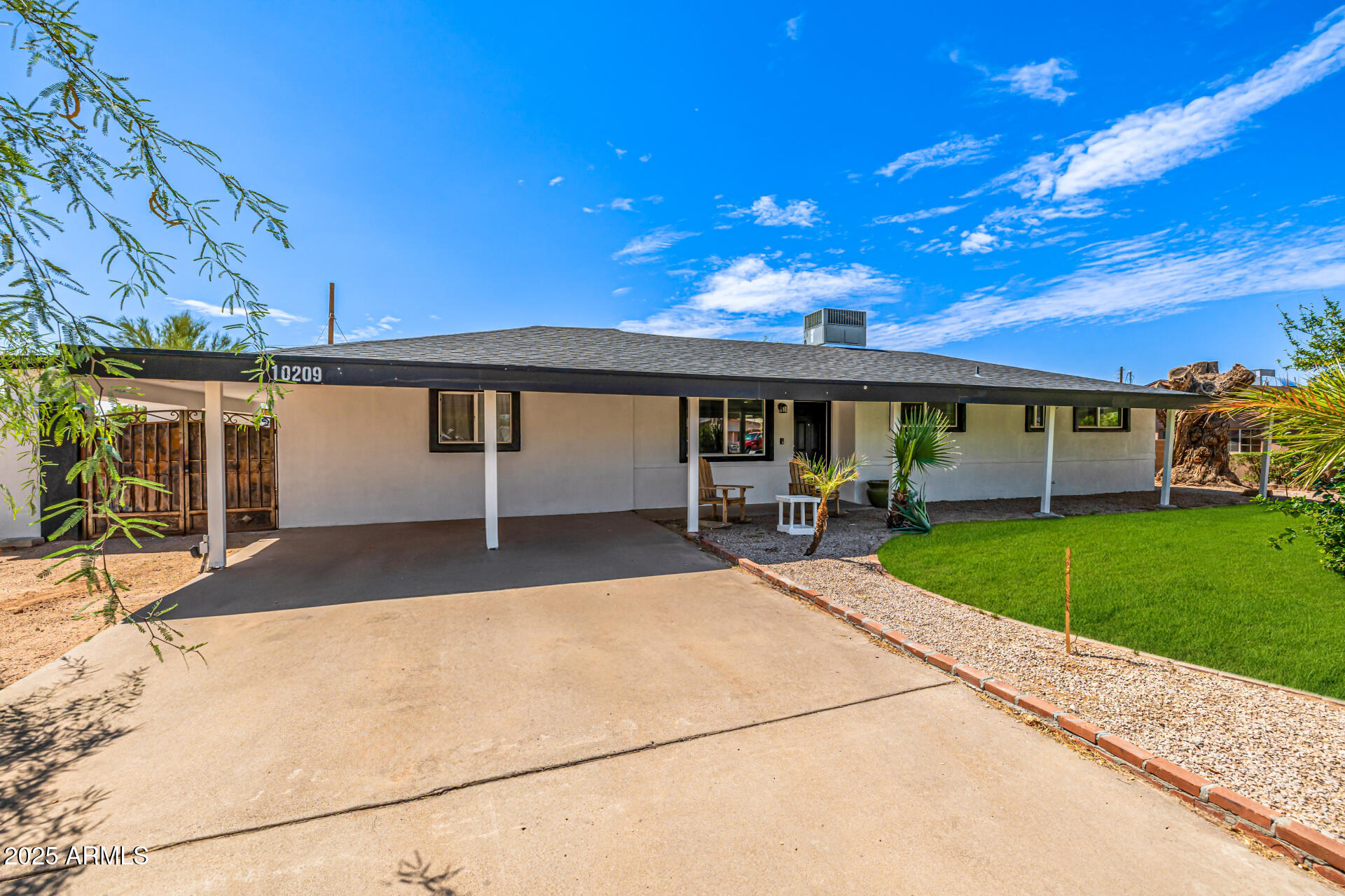 10209 E JONES Avenue