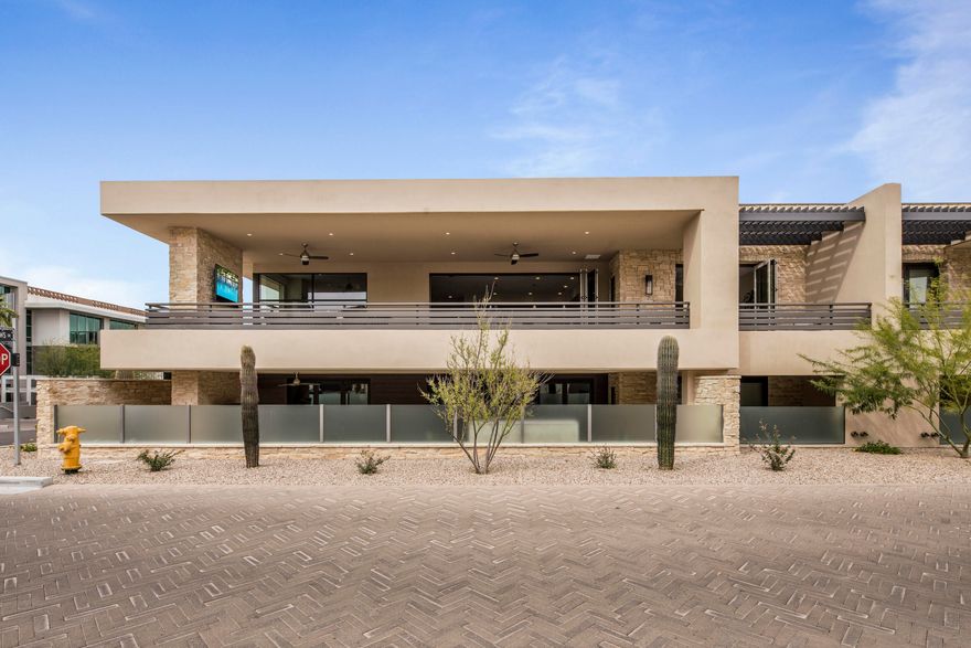 Absolutely gorgeous luxury villa at Mountain Shadows Resort Paradise Valley location! Featuring 3 bdrms, 3.5 bathrms, 2 car private driveway, 2 car private attached garage, private elevator/ stairs to living level, 24 hr. guarded entry, and Camelback Mtn views from the 800+ sq ft. outdoor deck. Enjoy resort-style living with full amenities at adjacent resort with distinct architectural designs. Luxurious designer features include 20 ft. high entry foyer, Wolf combo dual fuel range oven & microwave, Sub-Zero refrigerator, Asko dishwasher, Zephyr hood,  Silestone quartz statuario polished waterfall island & counter tops, 146 bottle Sub-Zero wine chiller, Distinctive cabinets in horizontal grain alder, 10 ft. high ceilings, 9 ft. bi-fold doors to deck, 9 ft. bi-fold from master suite to deck, and indoor/ outdoor fireplaces -- ideal for entertaining!! Very centrally located. Close to all that Paradise Valley & Scottsdale have to offer w/ nearby shopping, fine dining, 5 star resorts, hiking trails, and world class golf. Quick access to either the 101 Fwy or SR51. Easy commute up north or south to the airport.
