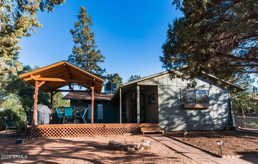 Beautifully remodeled 1816 sq ft 4-bedroom, 2-bath with a 420 sq ft. separate guest house. The main house features a bright and open floor plan designed for modern living in Rim Country. The updated kitchen showcases sleek quartz countertops, stainless steel appliances, and island--perfect for both everyday use and entertaining. Enjoy stylish vinyl flooring throughout and tastefully renovated bathrooms with custom tiled showers.

The guest house is a 1-bedroom, 1-bath, offering incredible flexibility--ideal for visiting guests, a private home office, or potential rental income. A fantastic opportunity to own a move-in-ready home with added value and versatility!