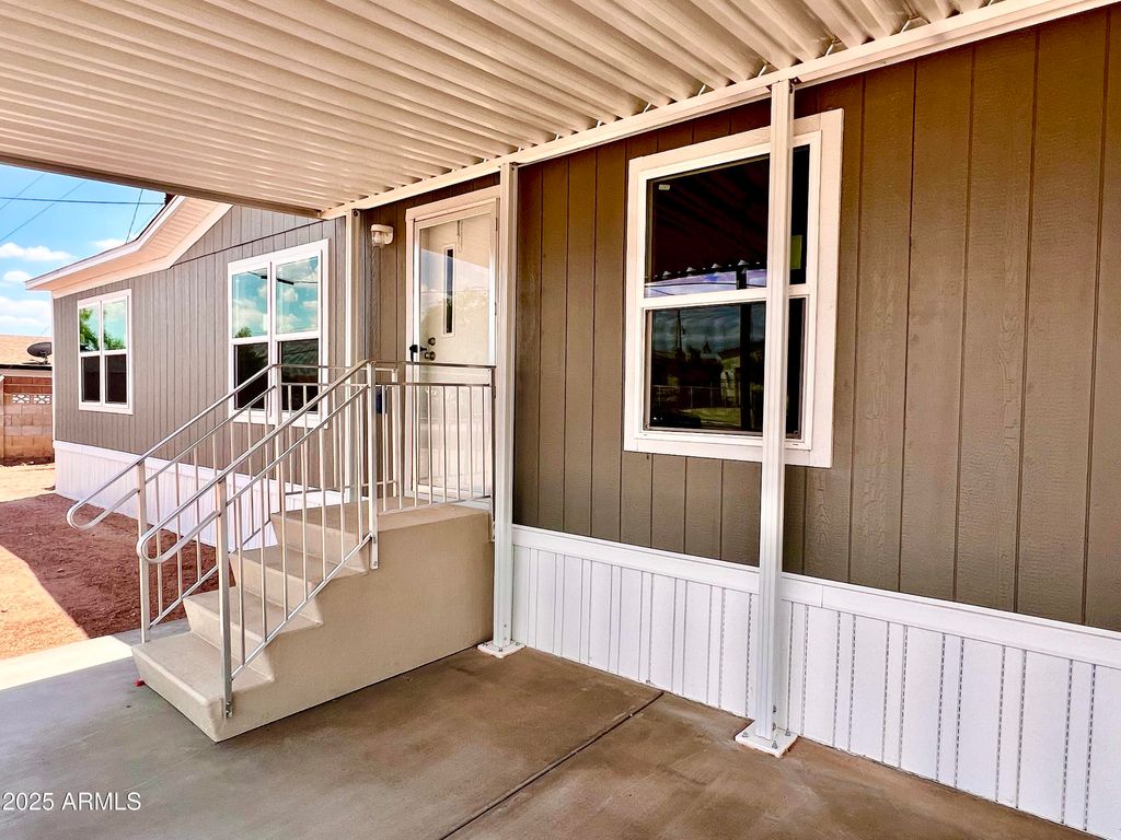 Photo of 900 S Warner Drive, Apache Junction, AZ 85120 (MLS # 6905471)