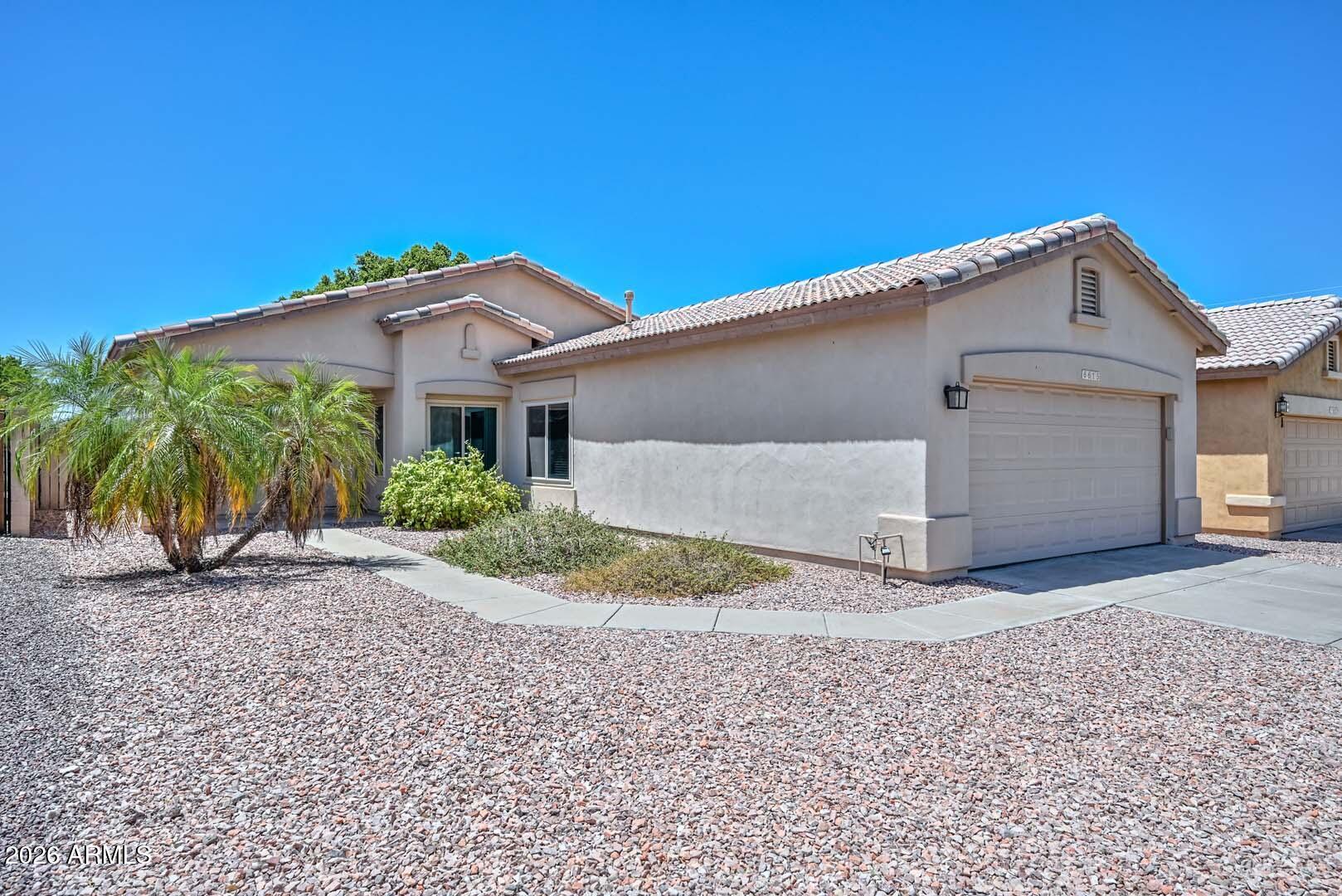 6615 W EL CORTEZ Place