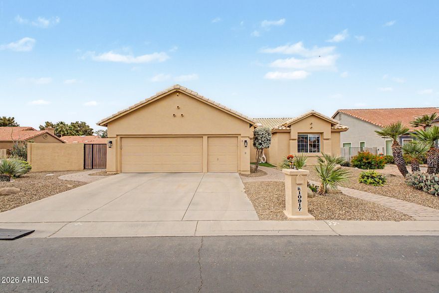You won't find a more upgraded turn key home in ALL of Sun Lakes! Stunning corner lot home with ALL the bells and whistles! THE party backyard of them all! Large heated pool and spa, backyard kitchen cost 20K! . Infra red heaters, 3-car garage w/ a/c, custom cabinets. Lots of artificial turf, 9141 s/f lot. THE best ultimate chefs kitchen with absolute top-of-the-line GE Profile and upgraded appliances. French door convection & air fryer oven. Open great room,, plantation shutters, motorized BR blinds, upgraded flooring, & fireplace.  Owned solar connected to SRP grid.  Den ideal for office or study. The master bedroom has backyard access, an updated ensuite with dual sinks, a jetted tub, Check the updated improvement list of this beauty estimated to be in excess of $150,000 by this owner.