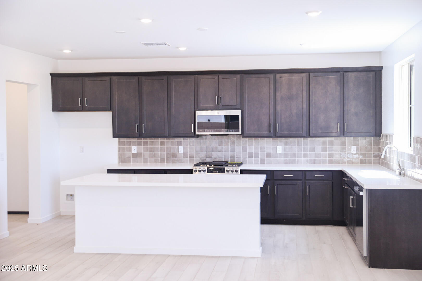 2445 W ROWEL Road