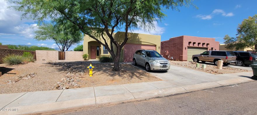 This great home is ready for new owners. This is a super popular split floor plan. There is an open great room with lovely kitchen that includes a walk in pantry, granite counters with a breakfast bar, stainless appliances and tons of counter space. There is a breakfast room or dining area located off of the kitchen. The master suite is very cozy and has 2 walk in closets, dual sinks in the master bath a nice tub/shower. The secondary bedrooms are nicely separated and the main bath is convenient to both of them. There is also a large laundry room just off of the garage. Step out back and enjoy the low maintenance backyard. There is a covered patio, partial mountain view as well as an open patio. You do not want to miss this one.