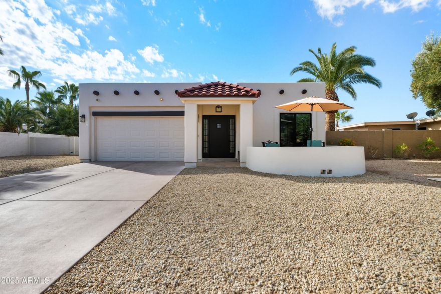 Welcome to your dream home in the highly sought-after Cottonwood community Sun Lakes!  This beautifully remodeled 1,950 sq. ft, 3-bedroom, 2-bathroom property sits on an exceptionally large, private lot with endless opportunities for outdoor living.  Recently upgraded with fresh landscaping, multiple patios, and inviting sitting areas, There is also a significant space in the front yard to add an extra garage, storage area, or living space.  The backyard is a blank canvas—perfect for adding a pool, casita, or your ultimate outdoor entertaining area.
Inside, the home features an inviting open-concept floor plan with bedrooms thoughtfully positioned for maximum privacy. The primary suite is a true retreat, showcasing a dramatic spa-like bathroom with an all-glass shower and a one-of-a-kind walk-in closet. Two additional bedrooms are generously sized, each with ample closet space and abundant natural light.
Living in Cottonwood means enjoying resort-style amenities right at your doorstep, including golf, pickleball, dining, and a brand-new private workout facility. Plus, you'll have access to all five Sun Lakes communitiesoffering endless opportunities for recreation, relaxation, and social connection.
Don't miss this rare opportunity to own a move-in ready home on one of the largest lots in Sun Lakes!