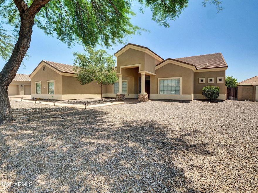 LOOKING FOR A HUGE SINGLE LEVEL CUSTOM HOME IN A GATED COMMUNITY?  THIS IS IT!  HUGE 4BEDS, 4.5BATHS, 4CAR-GARAGE, ON ALMOST HALF ACRE LOT, WITH PRIVATE POOL. NICE GORMADE KITCHEN SET UP WITH GRANITE COUNTERTOPS, STAINLESS STEEL APPLIANCES, THE KITCHEN OVERLOOK FAMILY ROOM WITH SOARING 12' CEILING THROUGH OUT.  EACH BEDROOM HAS IT OWN BATHROOM.  THE PROPERTY IS LOCATED ONLY A FEW MINUTES TO WESTGATE ENTERTAINMENT DISTRICT WITH MANY RESTAURANTS, SHOOPING, AND EASY ACCESS TO LOOP-101.  GREAT OPPOTUNITY TO OWN A HUGE CUSTOM HOME IN A NEW BOOMING AREA OF GLENDALE.   IT'S  A MUST SEE!