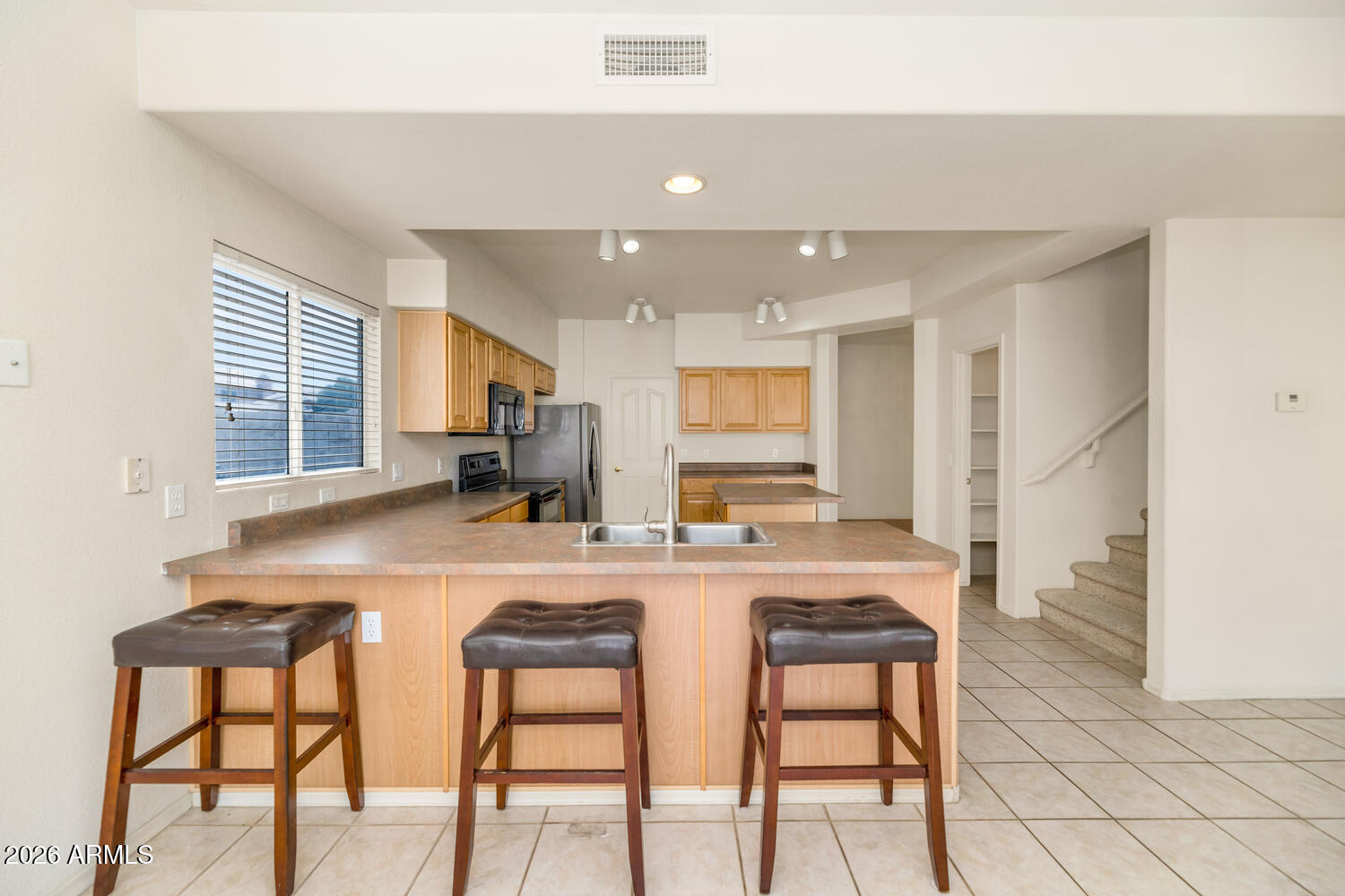 7212 W SURREY Avenue