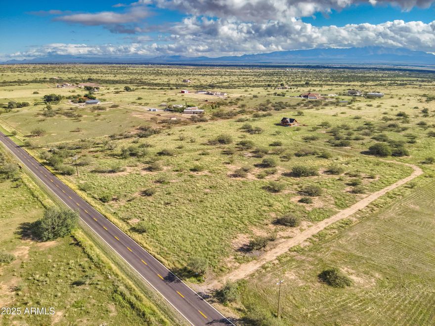 Create your ideal homestead on this scenic 4.01-acre parcel in Southern Arizona, zoned RU-4 for greater building flexibility and freedom. With paved road frontage and both legal and physical access, getting to the property is simple and reliable. Power is already on-site, reducing time and cost as you plan your build. Enjoy breathtaking views of the Coronado Mountains, just minutes from the Coronado National Memorial and Coronado Cave—perfect for hiking and outdoor exploration. Site-built homes are required, preserving the charm of the area. Horses and livestock are allowed with proper fencing. Located about 15 miles from Sierra Vista and 20 miles from Bisbee, this property offers the perfect blend of privacy, convenience, and possibility in a peaceful rural setting.