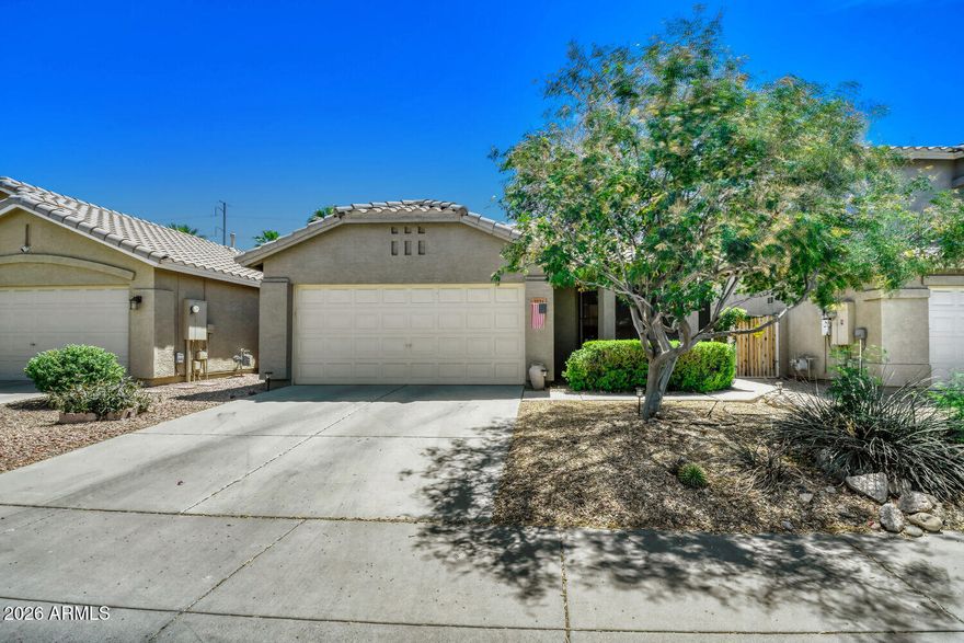 Welcome to this beautifully maintained 3-bedroom, 2-bathroom home. Thoughtfully updated, it features a newer AC system installed just a few years ago. The spacious great room flows seamlessly into a charming dining area, creating an inviting space for both relaxing and entertaining. The remodeled kitchen and tile flooring add modern appeal, and the refrigerator, washer, and dryer are all included for your convenience. Ideally located near Desert Ridge, you'll enjoy easy access to excellent dining, shopping, and quick connections to the interstate.