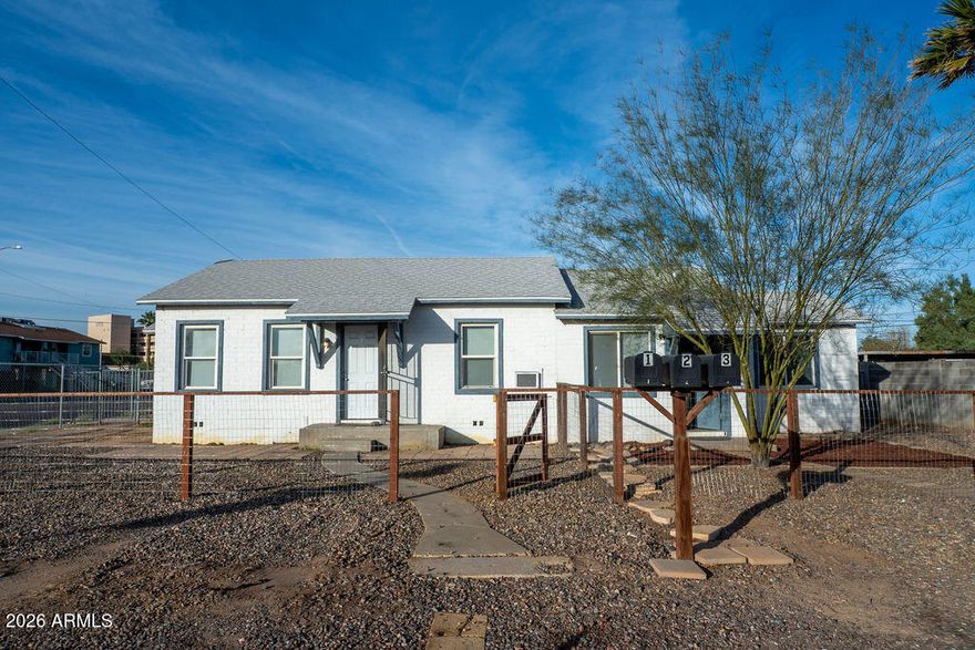 This remodeled duplex is fully rented with a 2 bedroom 1 bath and 1 bedroom 1 bath unit.  There is a 3rd building that could be renovated for a triplex.  This property was recently combined into one lot with 9,780 square feet.  Perfect for additional structures and rental income options.

DO NOT DISTURB TENANTS - PLEASE