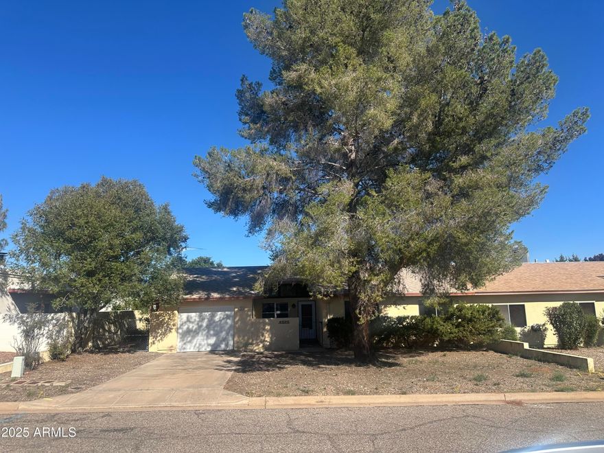 Don't miss this adorable 2 bedroom 2 bath condo. Large kitchen and Az room!! Cute little fenced yard and a garage!! Make this house your home!!