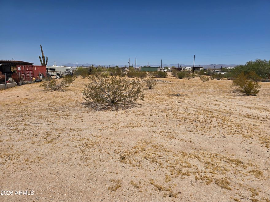 Discover the perfect blend of country living and future-ready convenience on this beautiful parcel in Florence, AZ! Major improvements are already in place, including permits pulled for septic installation and electric design, plus a shared well already installed. Save time and move closer to building your dream home, manufactured home, barndominium, or investment property. Enjoy stunning desert sunsets, mountain views, wide-open skies, and peaceful rural living with no HOA. Bring your RVs, ATVs, horses, and toys! See photos of the home plans for inspiration. Great opportunity to build now or invest in one of Florence's growing areas.