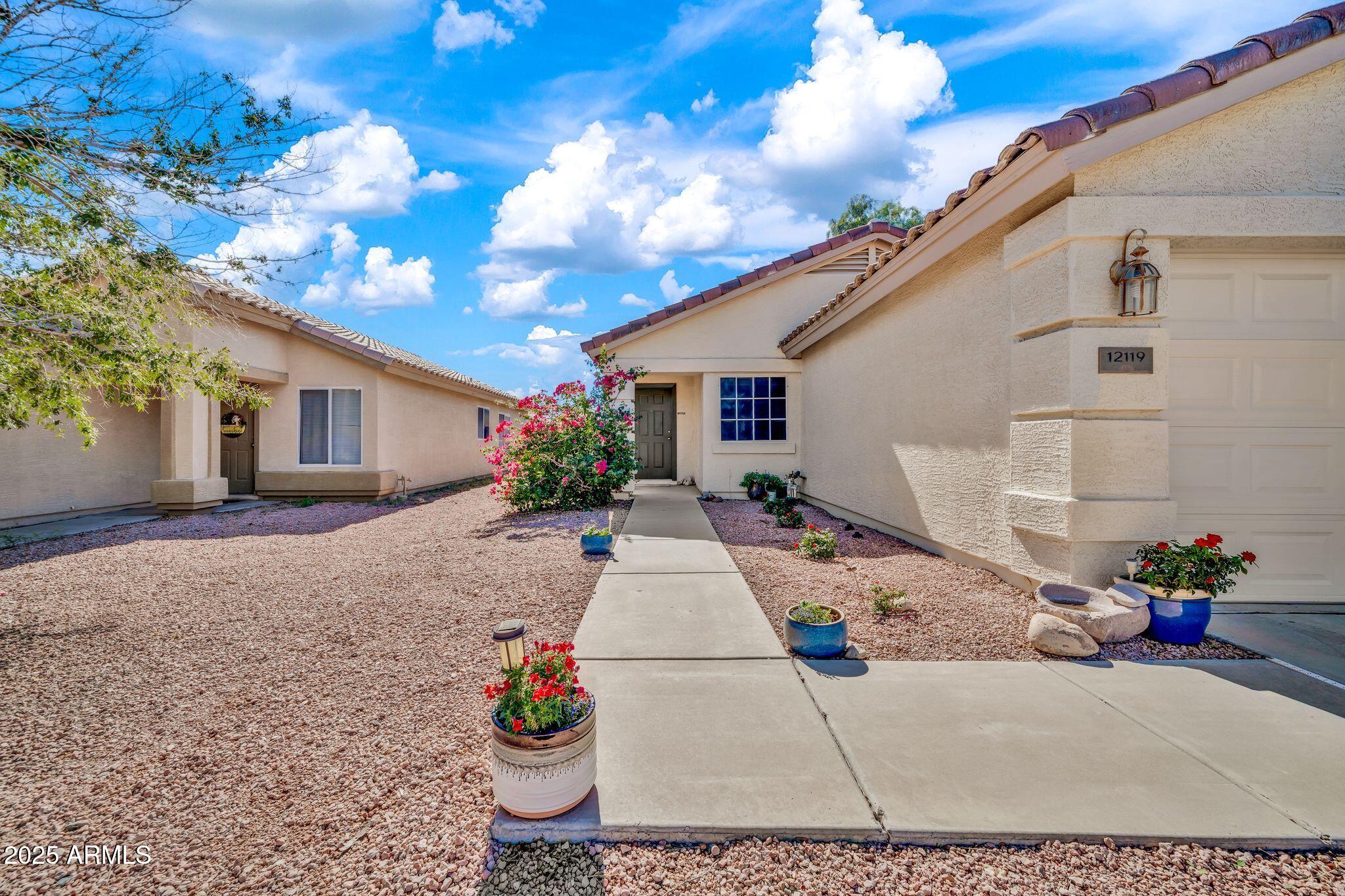 12119 W DAHLIA Drive
