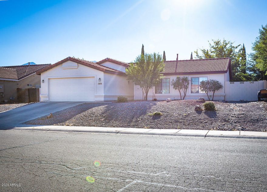 Here is your opportunity to live in this highly desirable subdivision!! Located near schools, shopping and easy excess to Fort Huachuca. 
Well maintained 3 Bedroom 2 Bath, great room with fireplace, spacious kitchen with breakfast bar, 2 car garage all on almost a quarter acre lot with extra large covered patio. Low maintenance professionally landscaped yard.