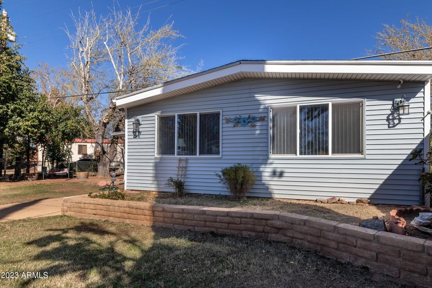 This is a large home with new carpet throughout, ceiling fans, dishwasher, gas stove, updated vanity and sink in main bathroom, vertical blinds, large screen porch and a large family room/den added on back of home, large lot, shed. Home is centrally located close to grocery stores, restaurants, Veterans Park across Fry Blvd., close to banks and businesses. Waiting for new owners.
