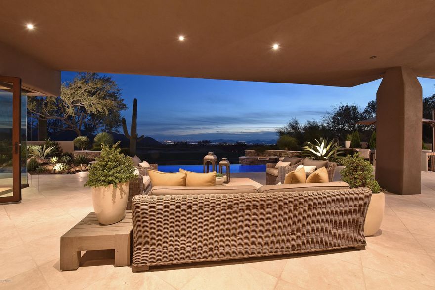 Rare opportunity located in the prestigious golf community of Desert Highlands. Soft contemporary Santa Barbara residence masterfully built with superior craftsmanship to the highest of standards, designed by Morehouse, MacDonald & Assoc.  The open floor plan creates the ultimate entertaining environment blending living, dining, family, chef's kitchen & bar.  The luxurious owner's suite enjoys a private courtyard with fountain/spa & direct veiws of Pinnacle Peak. Extensive use of
Marmorino plaster, box beam herringbone ceilings, reclaimed hand scraped white oak & french limestone flooring, Italian doors, hardware & windows...  just a few of the features that impressed the editors at Phoenix Home & Garden Magazine. Fully automated with Lutron, Sonos, Control 4, IAqualink etc.
$2M remodel in 2002 and recently re-mastered to update & showcase this most magnificent home!