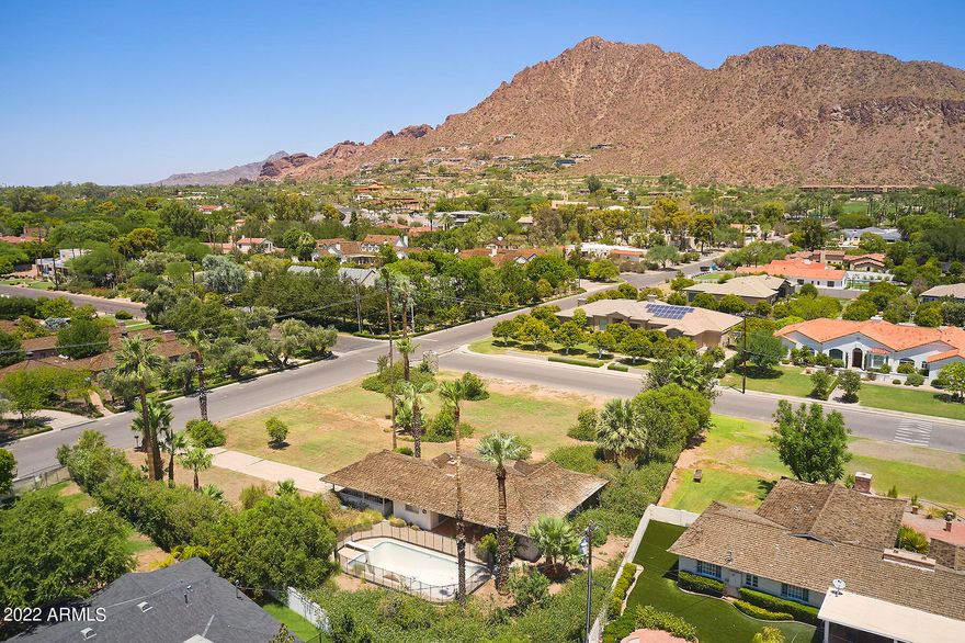 For the discriminating buyer that refuses to compromise for anything but the best. This spectacular corner lot close to 1 acre is situated on Exeter Blvd the most coveted street in prestigious Arcadia proper. Mesmerizing views of the iconic statuesque Camelback Mountain are awe inspiring. Create your dream home as the possibilities are endless on this phenomenal lot. Close proximity to the opulent Phoenician Resort, culinary restaurants in Scottsdale and Old Town, the bustling airport, vibrant downtown Phoenix and beautiful A.S.U campus. First time on market since 1976 making it a rarity for a lot of this esteemed caliber to even be available.  This is a once in a lifetime opportunity to own this crown jewel. Make your dreams a reality.
