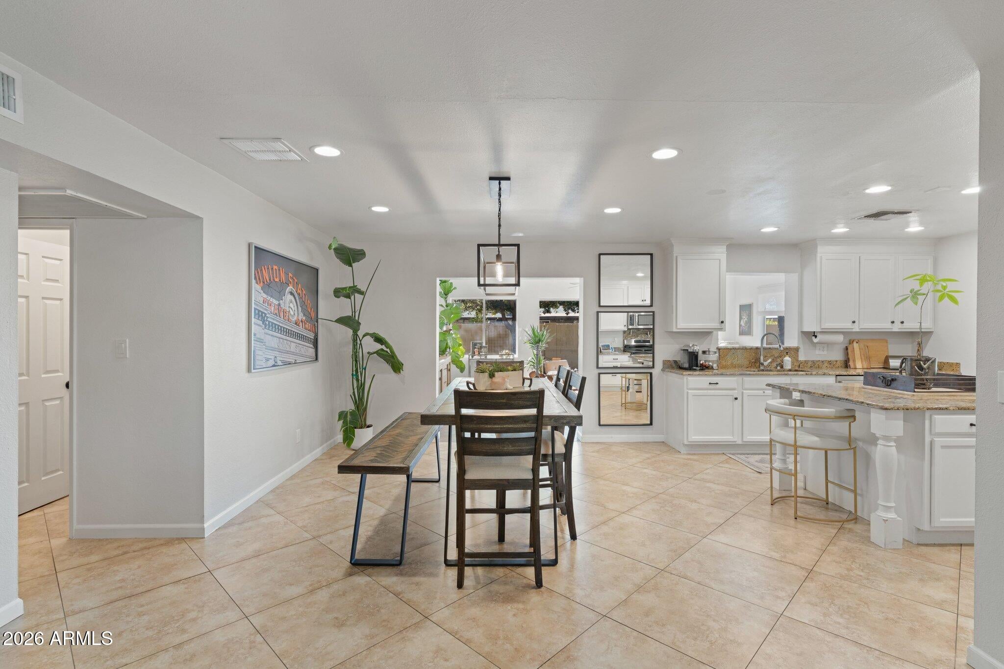 8301 E MINNEZONA Avenue
