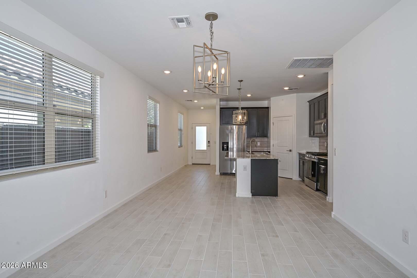 14203 W VOLTAIRE Street
