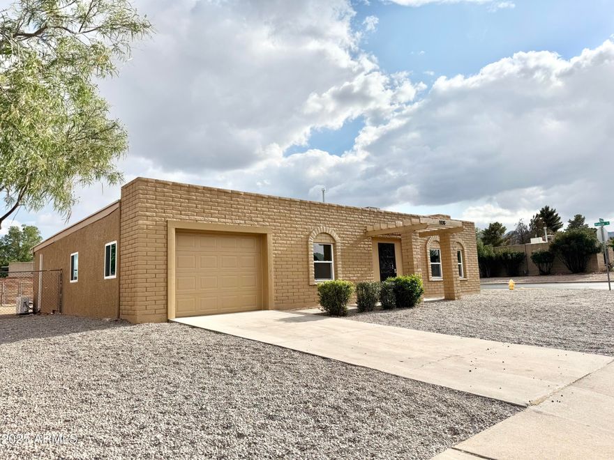 Owner Agent! This newly renovated 3 bed, 2 bath home offers 1,831 sq ft of modern living on a desirable corner lot. Features include tile flooring throughout, quartz countertops in the kitchen and bathrooms, and all-new dual-pane windows filling the home with natural light. Enjoy cozy nights by the fireplace in the family room, while the master suite offers a walk-in shower. Recent upgrades include a new 200-amp electrical panel, new mini-split system, new roof, new motorized garage door with attached garage, and new toilets. The home also offers a beautifully landscaped front yard with river stone rock, while the expansive backyard provides a blank canvas for your vision. With thoughtful updates, modern finishes, and move-in-ready appeal, this home is ready for you to make it your own.