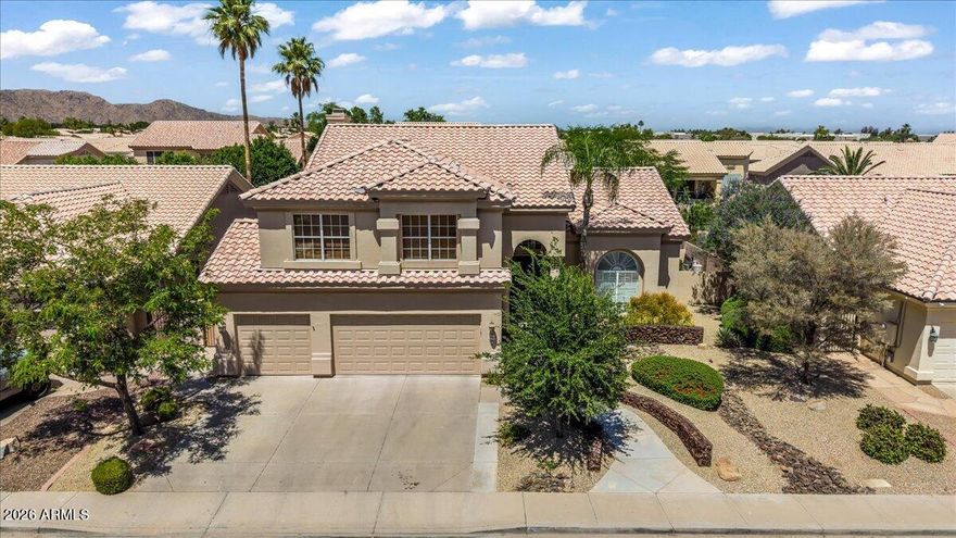 Location, location, location! This large, upgraded home is close to everything--just minutes to freeways, shopping, and restaurants. Five spacious bedrooms, some with walk-in closets--downstairs bedroom could also be an office and is adjacent to a full bath with backyard access.  Updated kitchen with on-trend farmhouse features. $30K+ spent on complete primary bathroom remodel in 2024. Roof was replaced in 2025! Freshly painted interior & new carpet thru-out. Pool equipment was replaced in 2019 & the pool has a new removable fence. Refrigerator, washer & dryer all stay. Beautiful low maintenance front yard landscaping featuring striking gabion walls. All homes in this part of the subdivision feature 3-car garages and elevated smooth stucco exteriors. You will love living here!