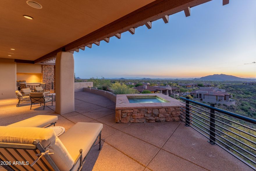 Golf Membership available! Nestled within the highly desirable Lookout Ridge Village in Desert Mountain, this inviting residence offers a perfect blend of comfort, privacy, and captivating scenery. Perfectly positioned to capture fabulous views of the Valley, sparkling city lights, vibrant sunsets, and surrounding mountain vistas, the home celebrates the very best of the Sonoran Desert landscape.
A spacious patio retreat, complete with a built-in barbecue and a soothing spa, creates an ideal setting for both relaxation and entertaining. Expansive windows and glass doors fill the interior with natural light, seamlessly blending indoor and outdoor living while showcasing the breathtaking views from multiple vantage points. Inside, the home exudes warmth and charm with a thoughtfully designe layout that lives comfortably and effortlessly. Located within the prestigious Desert Mountain community--renowned for its seven golf courses, exceptional dining, world-class fitness, and miles of private hiking trails--this property offers a rare opportunity to enjoy resort-style living with immediate golf access in one of North Scottsdale's most coveted villages.