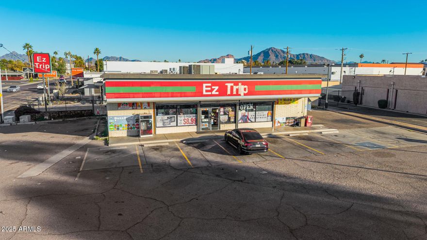 True Hard-Corner Retail Opportunity for sale is a freestanding ±2,400 SF convenience store located on a true hard corner at North 40th Street and East McDowell Road in East Phoenix. The property sits on a ±15,769 SF lot with excellent frontage of ±120 feet on 40th Street and ±130 feet on McDowell Road, providing strong visibility, access, and signage exposure.The property is zoned C-2 (Intermediate Commercial) and the existing tenant is month-to-month, creating an ideal value-add or owner-user opportunity. Buyers can re-lease at market rates, re-tenant, or occupy the building. The site benefits from strong traffic counts with approximately 32,000+ vehicles per day on McDowell Rd and 16,000+ vehicles per day on 40th St.
