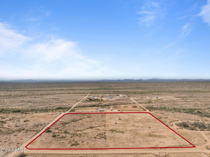 level & fully useable 10-acre parcel, Ideal for horse property with plenty of space for a full setup or other outdoor needs, such as
workshops or barns or anyone in need of wide-open space. The square shaped lot features low brush, with the north 5 acres already cleared & ready for
use with deed restrictions in place to protect your investment. Short drive to Lake Pleasant, Surprise & Wickenburg, providing convenient access to
recreation, shopping, and dining.This property offers a unique opportunity to create your own custom equestrian estate or rural retreat. Don't miss out on
this versatile land, ready for your plans & improvements