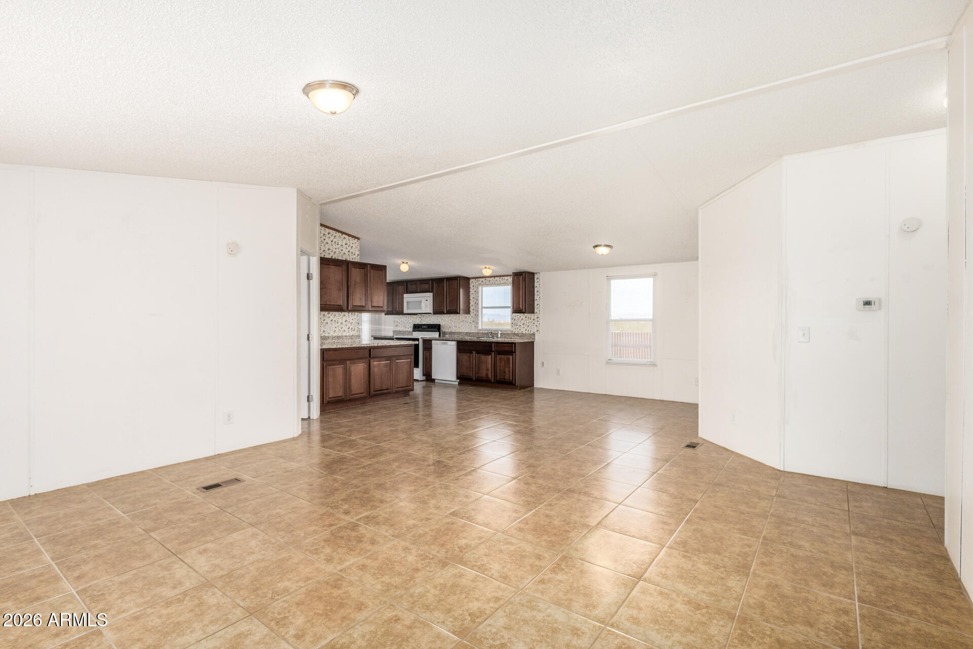 COMM @ NE COR OF SEC 12 5S-9E TH W 1042.26' TH S54 - Residential