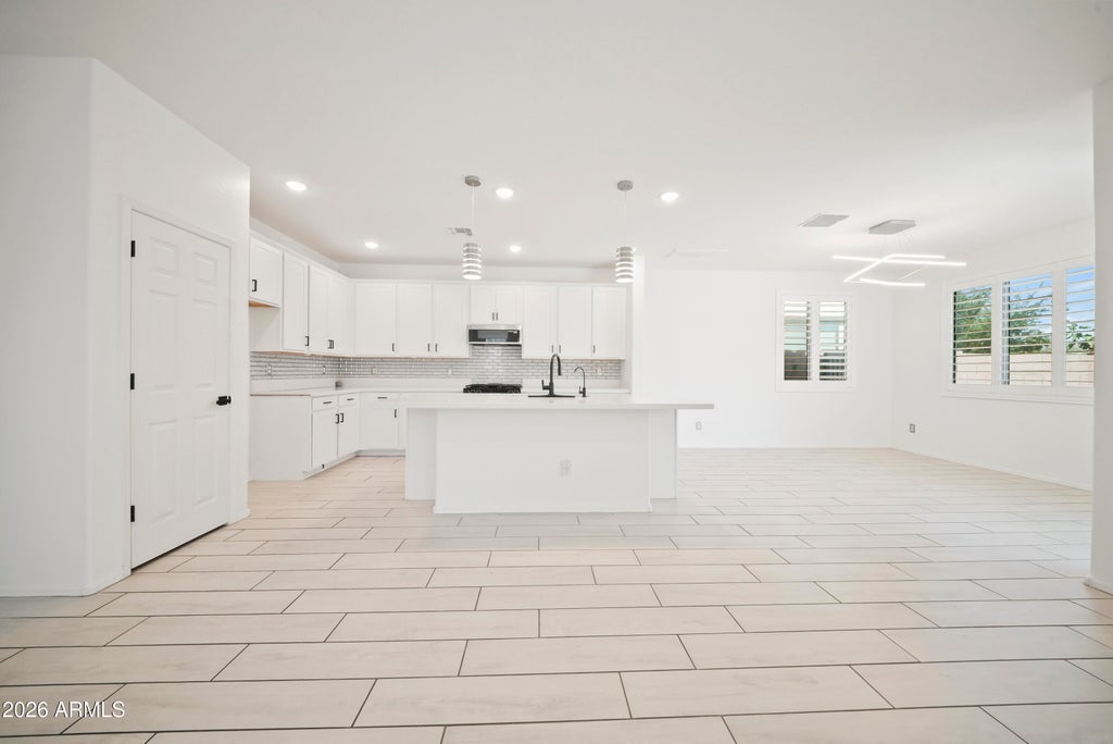 Photo of 8853 W Fleetwood Lane, Glendale, AZ 85305 (MLS # 7043760)