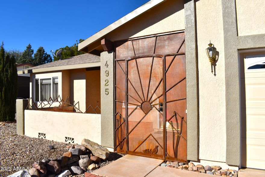 WELCOME HOME! This beautiful and well kept property has an amazing front patio with beautiful Wrought Iron gate to welcome you in. Gorgeous front door opens to a spacious living room with vaulted ceilings, plantation shutters and tile flooring in all the high traffic areas. The kitchen is updated with granite counters, plenty of storage and a double oven. This SPLIT floorplan is currently being used as a 3 bedroom with an office, but can easily be converted to a full 4 bedroom home. VERY LARGE back patio with plenty of shade and a great sized yard for all your gardening or entertainment needs. The PAID OFF SOLAR is just an added bonus!! Schedule your showing TODAY!
