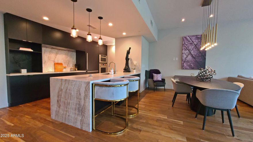 Luxurious Fully Furnished Loft-Style Living at Iconic Mountain Shadows Resort with Upgraded Contemporary Finishes. This Stunning Executive Condominium has a Modern Open Space Feeling with a Floor to Ceiling Wall of Windows to the Private East Facing Patio. The Sleek Stellar Kitchen and Entertaining Living/Dining Areas are Spacious and of Prime Design Quality. 2 Impressive Ensuite Bedrooms Located Upstairs (and can be accessed via elevator).  Main Bedroom has a Private View Balcony. 2 Generous Underground Garage Spaces plus Storage.  Located in Prime Paradise Valley, Mountain Shadows Resort Offering the Finest Amenities including Multiple Scenic Pools, Fitness Facility, Fabulous Dining/Restaurants, Golf and so much more. Mountain Views Surrounding this Resort are a World Famous Advantage.