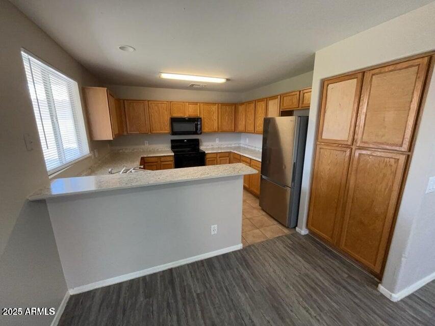 12717 W LAUREL Lane