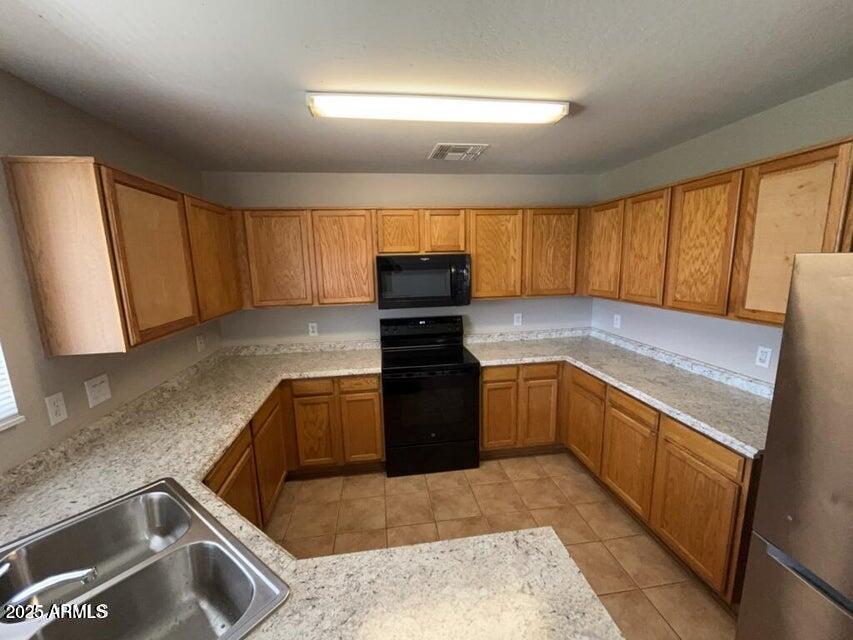 12717 W LAUREL Lane