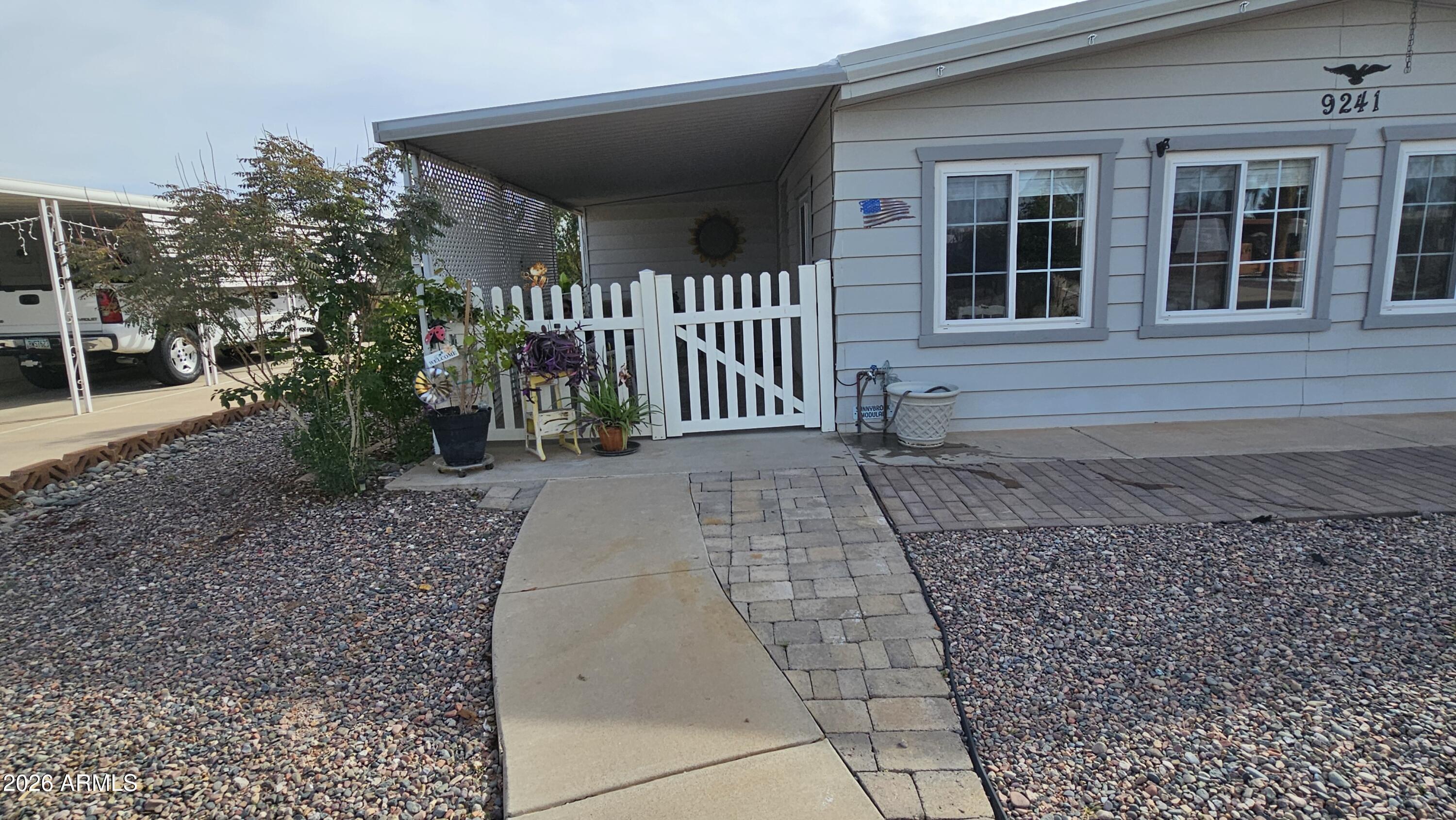 9241 E CACTUS Lane S