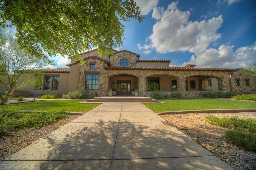 This exquisite Arcadia at Silverleaf home, completed in 2015, offers a modern warm grey and soothing white color palette with quartz counters, white custom cabinetry, and stunning grey limestone herringbone flooring. Large open spaces feature sensational architectural ceilings with crown molding and sophisticated lighting. The chefs kitchen includes top-of-the-line Wolf and Sub-Zero appliances, a large center island with prep sink, breakfast bar, eat-In breakfast nook, and butlers pantry with wine refrigerator and refrigerated drawers. The downstairs master features stunning mountain views, his and hers closets, a separate outdoor shower and his and hers water closets.  The oversized laundry room with two full-sized washers and dryers, locker style mud room entry, and ... built in custom kennel, makes this room as spectacular as it is functional. Other features include several gas fireplaces, enormous bedrooms with en-suite baths and attached sitting rooms or playrooms, two powder baths located on the main floor for guest convenience, and a large, bright, office separate from the bedrooms for privacy. Enjoy the beautifully landscaped backyard oasis with wrap around covered patio, a true resort style pool and spa with the entire surface completed with stunning glass tile, and an outdoor kitchen with Wolf BBQ, refrig and prep sink. The side yard hides a secret garden with raised boxes ready for fresh vegetables or plants. Adjacent to the pool, the separate casita features a kitchenette, pool access and full bath for your guests. The oversized garage with epoxy floors can house 4 cars plus allow for other vehicles and storage. This guard gated home is situated across from one of the three neighborhood parks and offers a lush serene view from the large front porch. 

Arcadia at Silverleaf is conveniently located on Thompson Peak and Legacy and features large, custom "front porch living" style homes on winding tree-lined streets, several large gathering parks, a playground, and several covered ramadas perfect for meeting with neighbors and friends.The surrounding area features a highly recognized A+ school, the Silverleaf Country Club, DC Ranch Country Club, the McDowell Mountain Ranch Aquatic Center and Skate Park, several shopping centers, and has easy 101 freeway access.