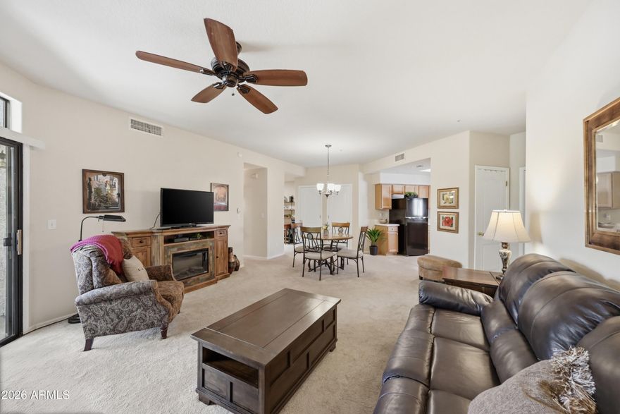 Cozy, convenient and immaculate home that comes furnished for your immediate move. Home offers ample and considerate layout, an inviting balcony, large storage space, and a light and bright environment. This gated 55+ community offers extra features like rentable storage garages on site, a luxurious pool and spa, fitness center, sports courts and a clubhouse. Home is also close to many of the areas fine golf courses so bring your rackets and clubs and enjoy all Arizona has to offer with this attractive turnkey living option.